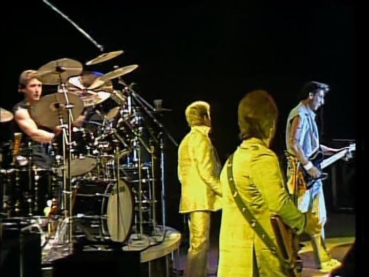 123 ROCK | The Who - My Generation - My Generation - 1965 | Live - Concert - Shea Stadium - Flushing - Queens - New York (State) - New York - United States of America (USA) - October 13, 1982 | Roger Daltrey (Lead Vocals, Harmonica), Pete Townshend (Guitar, Keyboards, Backing Vocals), John Entwistle (Bass Guitar, Keyboards, Backing Vocals), Keith Moon (Drums) | Music, Informations, Album Infos, Clip, Live, Concert, Photos, Video, Album Cover, Photographs 