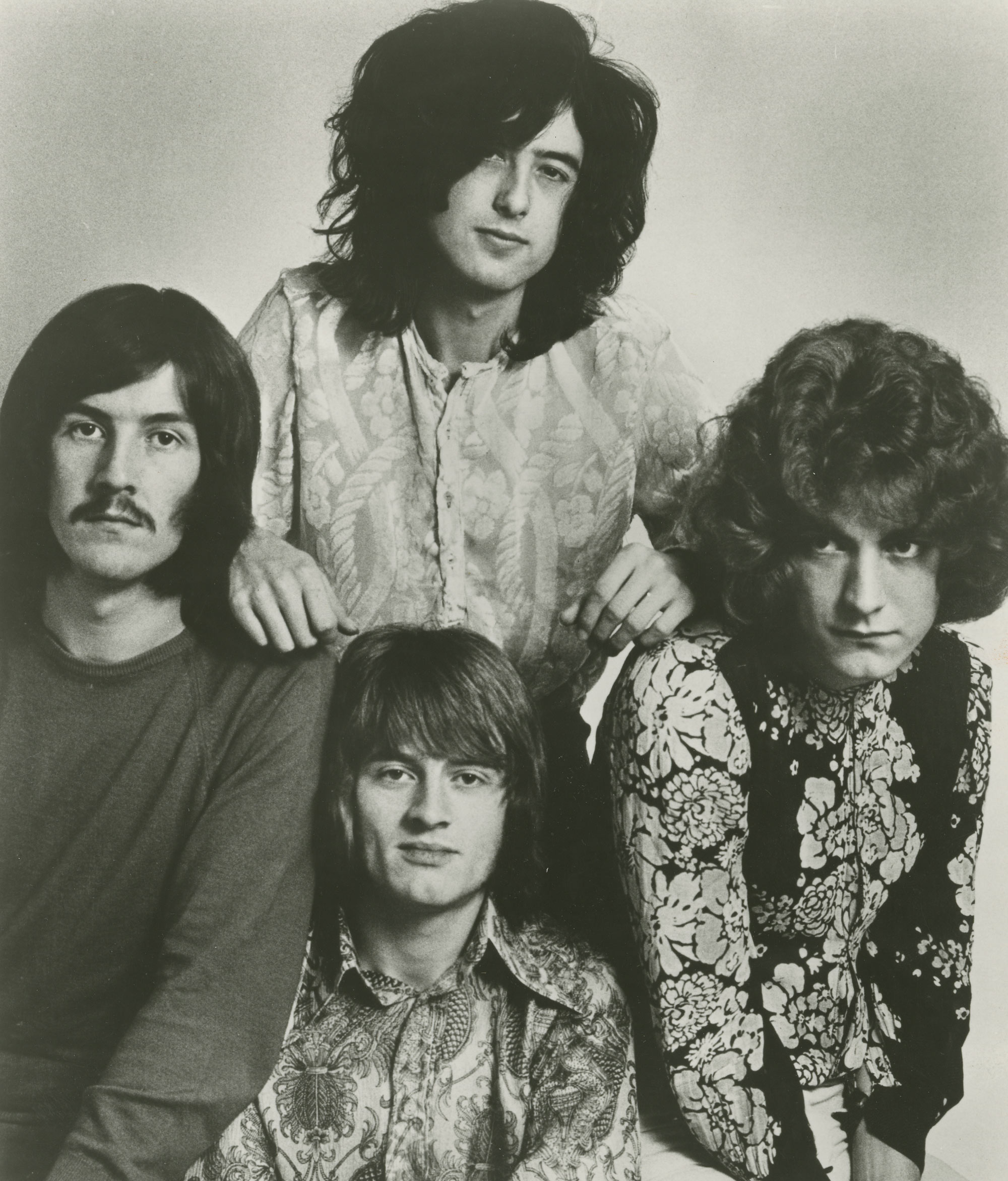 123 ROCK | Led Zeppelin | Robert Plant (Robert Anthony Plant) - August 20, 1948 - West Bromwich, Staffordshire, England, United Kingdom - Lead Vocals, Backing Vocals, Acoustic Guitar, Bass Guitar, Tambourine, Harmonica (1968 - 1980) (1994) (1998), Jimmy Page (James Patrick Page) - January 9, 1944 - Heston, Middlesex, London, England, United Kingdom - Electric Guitars, Rhythm Guitar, Acoustic Guitar, Twelve-string Guitar, Pedal Steel Guitars, Lap Steel Guitar, Slide Guitar, Double Neck Guitar with Six-String and Twelve-String, Bass Guitar, Mandolin, Theremin, Banjo, Dulcimer, The Gizmo, Backing Vocals (1968 - 1980) (1994) (1998), John Paul Jones (John Baldwin) - January 3, 1946 - Sidcup, Kent, London, England, United Kingdom - Bass Guitar, Guitar, Mandolin, Double Bass, Keyboards, Organ, Piano, Acoustic Piano, Electric Piano, Mellotron, Synthesizer, VCS3 Synthesizer, Hohner Clavinet, Hammond Organ, Harpsichord, Moog Synthesizer, Bass Guitar Effects Unit, Recorder, Backing Vocals (1968 - 1980), John Bonham (John Henry Bonham) (Also called : Bonzo, The Beast, Powerhouse) - May 31, 1948 - Redditch, Worcestershire, England, United Kingdom - Drums, Percussions, Timpani, Backing Vocals (1968 - 1980) | Genre : Hard Rock, Heavy Metal, Blues Rock, Folk Rock, Progressive Rock, Psychedelic Rock | Live | Concert | Photo | 17 | Photograph
