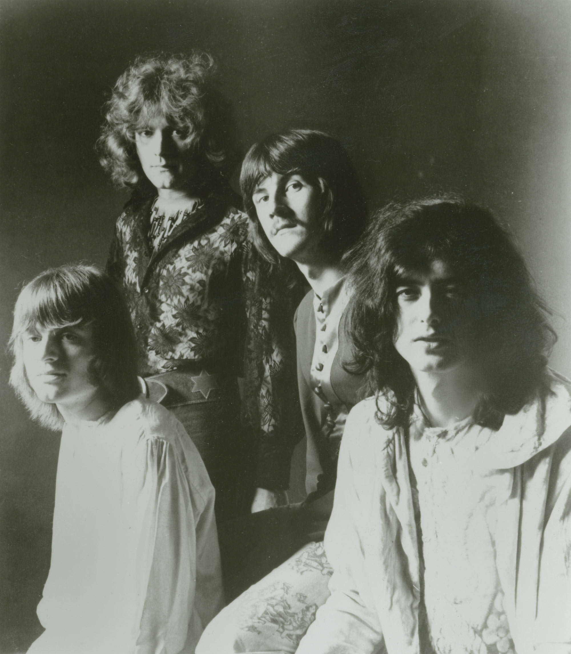 123 ROCK | Led Zeppelin | Robert Plant (Robert Anthony Plant) - August 20, 1948 - West Bromwich, Staffordshire, England, United Kingdom - Lead Vocals, Backing Vocals, Acoustic Guitar, Bass Guitar, Tambourine, Harmonica (1968 - 1980) (1994) (1998), Jimmy Page (James Patrick Page) - January 9, 1944 - Heston, Middlesex, London, England, United Kingdom - Electric Guitars, Rhythm Guitar, Acoustic Guitar, Twelve-string Guitar, Pedal Steel Guitars, Lap Steel Guitar, Slide Guitar, Double Neck Guitar with Six-String and Twelve-String, Bass Guitar, Mandolin, Theremin, Banjo, Dulcimer, The Gizmo, Backing Vocals (1968 - 1980) (1994) (1998), John Paul Jones (John Baldwin) - January 3, 1946 - Sidcup, Kent, London, England, United Kingdom - Bass Guitar, Guitar, Mandolin, Double Bass, Keyboards, Organ, Piano, Acoustic Piano, Electric Piano, Mellotron, Synthesizer, VCS3 Synthesizer, Hohner Clavinet, Hammond Organ, Harpsichord, Moog Synthesizer, Bass Guitar Effects Unit, Recorder, Backing Vocals (1968 - 1980), John Bonham (John Henry Bonham) (Also called : Bonzo, The Beast, Powerhouse) - May 31, 1948 - Redditch, Worcestershire, England, United Kingdom - Drums, Percussions, Timpani, Backing Vocals (1968 - 1980) | Genre : Hard Rock, Heavy Metal, Blues Rock, Folk Rock, Progressive Rock, Psychedelic Rock | Live | Concert | Photo | 18 | Photograph