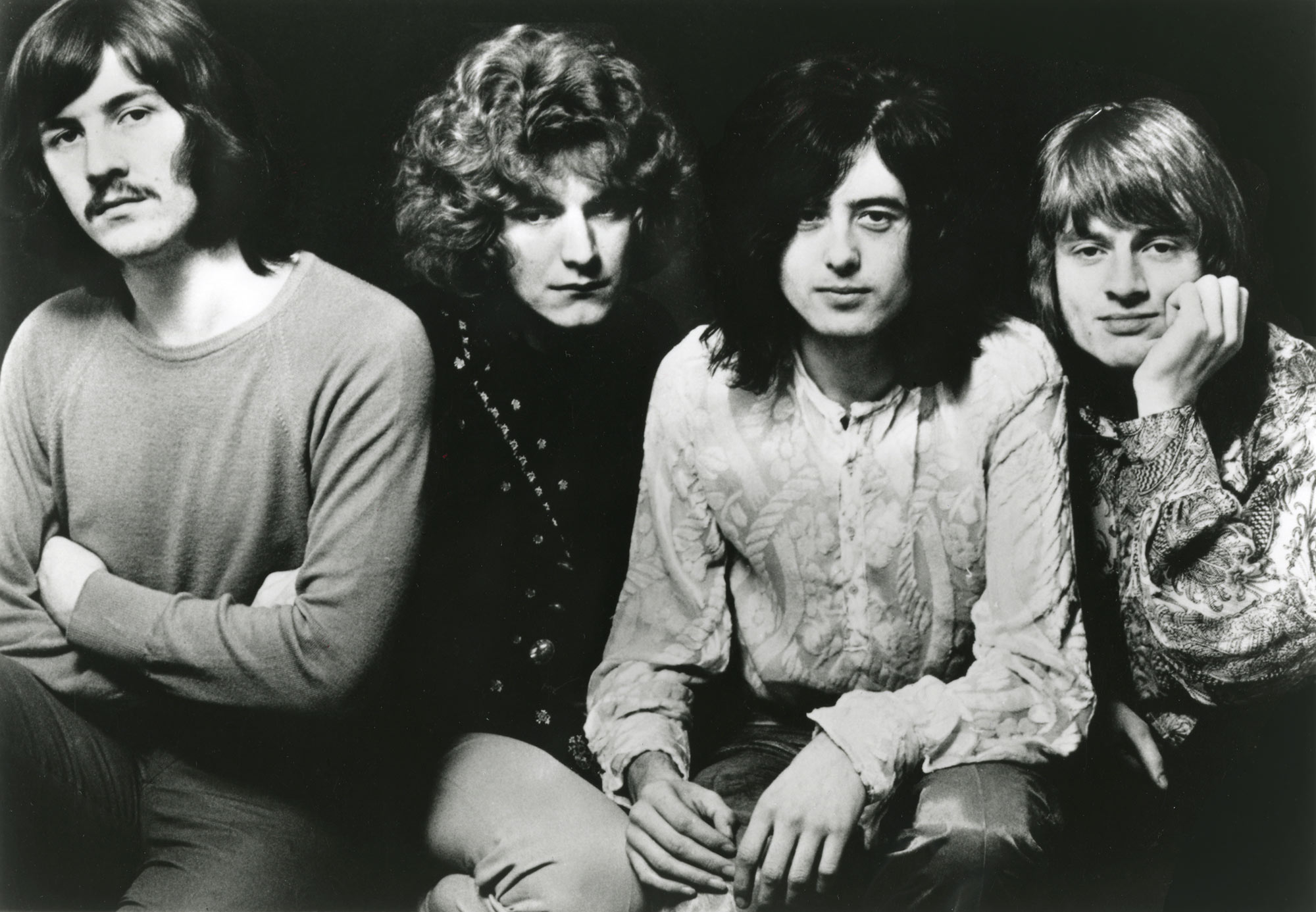 123 ROCK | Led Zeppelin | Robert Plant (Robert Anthony Plant) - August 20, 1948 - West Bromwich, Staffordshire, England, United Kingdom - Lead Vocals, Backing Vocals, Acoustic Guitar, Bass Guitar, Tambourine, Harmonica (1968 - 1980) (1994) (1998), Jimmy Page (James Patrick Page) - January 9, 1944 - Heston, Middlesex, London, England, United Kingdom - Electric Guitars, Rhythm Guitar, Acoustic Guitar, Twelve-string Guitar, Pedal Steel Guitars, Lap Steel Guitar, Slide Guitar, Double Neck Guitar with Six-String and Twelve-String, Bass Guitar, Mandolin, Theremin, Banjo, Dulcimer, The Gizmo, Backing Vocals (1968 - 1980) (1994) (1998), John Paul Jones (John Baldwin) - January 3, 1946 - Sidcup, Kent, London, England, United Kingdom - Bass Guitar, Guitar, Mandolin, Double Bass, Keyboards, Organ, Piano, Acoustic Piano, Electric Piano, Mellotron, Synthesizer, VCS3 Synthesizer, Hohner Clavinet, Hammond Organ, Harpsichord, Moog Synthesizer, Bass Guitar Effects Unit, Recorder, Backing Vocals (1968 - 1980), John Bonham (John Henry Bonham) (Also called : Bonzo, The Beast, Powerhouse) - May 31, 1948 - Redditch, Worcestershire, England, United Kingdom - Drums, Percussions, Timpani, Backing Vocals (1968 - 1980) | Genre : Hard Rock, Heavy Metal, Blues Rock, Folk Rock, Progressive Rock, Psychedelic Rock | Live | Concert | Photo | 19 | Photograph