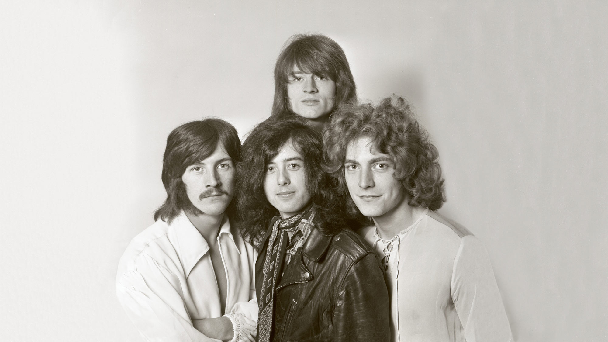 123 ROCK | Led Zeppelin | Robert Plant (Robert Anthony Plant) - August 20, 1948 - West Bromwich, Staffordshire, England, United Kingdom - Lead Vocals, Backing Vocals, Acoustic Guitar, Bass Guitar, Tambourine, Harmonica (1968 - 1980) (1994) (1998), Jimmy Page (James Patrick Page) - January 9, 1944 - Heston, Middlesex, London, England, United Kingdom - Electric Guitars, Rhythm Guitar, Acoustic Guitar, Twelve-string Guitar, Pedal Steel Guitars, Lap Steel Guitar, Slide Guitar, Double Neck Guitar with Six-String and Twelve-String, Bass Guitar, Mandolin, Theremin, Banjo, Dulcimer, The Gizmo, Backing Vocals (1968 - 1980) (1994) (1998), John Paul Jones (John Baldwin) - January 3, 1946 - Sidcup, Kent, London, England, United Kingdom - Bass Guitar, Guitar, Mandolin, Double Bass, Keyboards, Organ, Piano, Acoustic Piano, Electric Piano, Mellotron, Synthesizer, VCS3 Synthesizer, Hohner Clavinet, Hammond Organ, Harpsichord, Moog Synthesizer, Bass Guitar Effects Unit, Recorder, Backing Vocals (1968 - 1980), John Bonham (John Henry Bonham) (Also called : Bonzo, The Beast, Powerhouse) - May 31, 1948 - Redditch, Worcestershire, England, United Kingdom - Drums, Percussions, Timpani, Backing Vocals (1968 - 1980) | Genre : Hard Rock, Heavy Metal, Blues Rock, Folk Rock, Progressive Rock, Psychedelic Rock | Live | Concert | Photo | 20 | Photograph