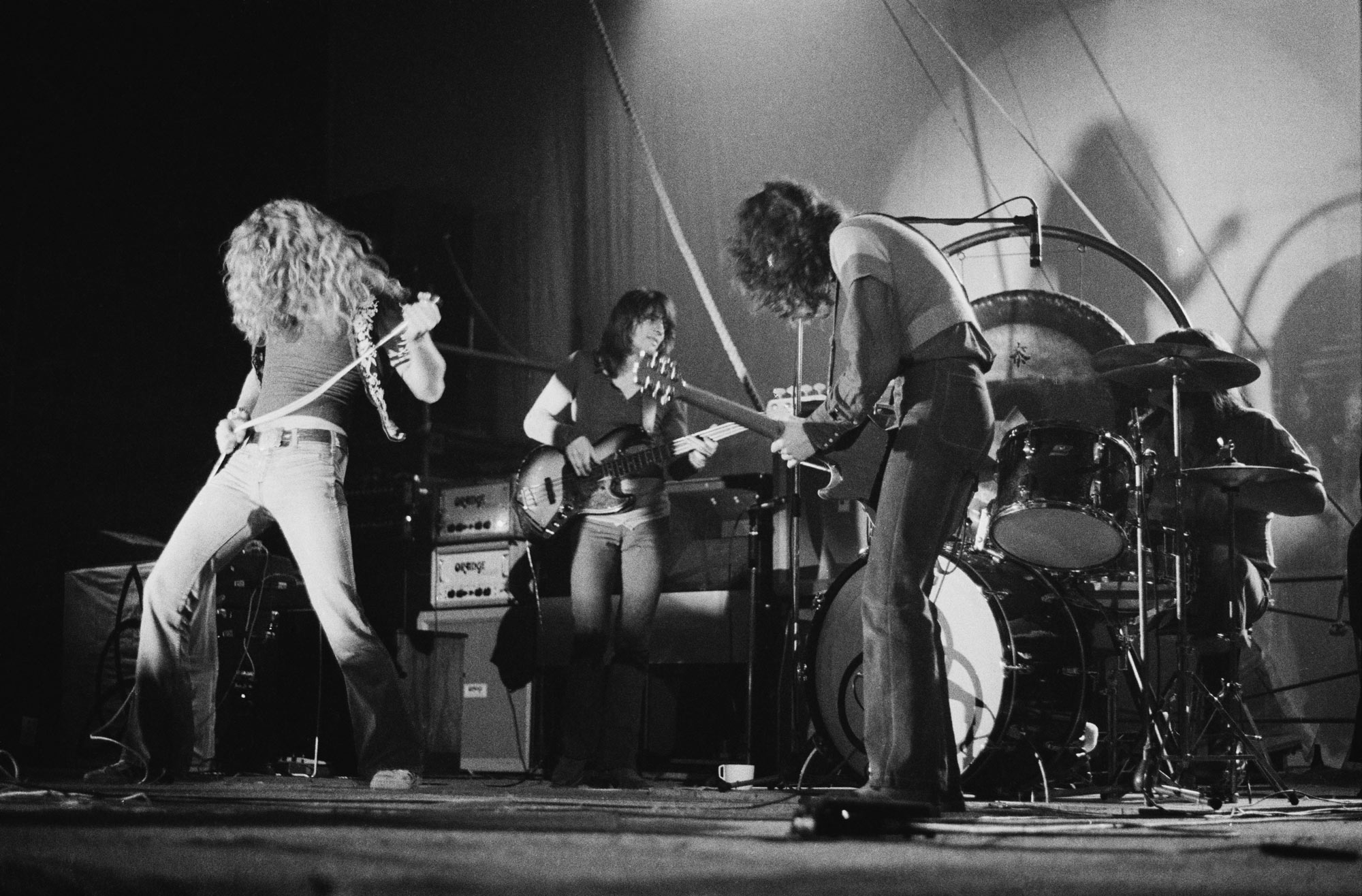 123 ROCK | Led Zeppelin | Robert Plant (Robert Anthony Plant) - August 20, 1948 - West Bromwich, Staffordshire, England, United Kingdom - Lead Vocals, Backing Vocals, Acoustic Guitar, Bass Guitar, Tambourine, Harmonica (1968 - 1980) (1994) (1998), Jimmy Page (James Patrick Page) - January 9, 1944 - Heston, Middlesex, London, England, United Kingdom - Electric Guitars, Rhythm Guitar, Acoustic Guitar, Twelve-string Guitar, Pedal Steel Guitars, Lap Steel Guitar, Slide Guitar, Double Neck Guitar with Six-String and Twelve-String, Bass Guitar, Mandolin, Theremin, Banjo, Dulcimer, The Gizmo, Backing Vocals (1968 - 1980) (1994) (1998), John Paul Jones (John Baldwin) - January 3, 1946 - Sidcup, Kent, London, England, United Kingdom - Bass Guitar, Guitar, Mandolin, Double Bass, Keyboards, Organ, Piano, Acoustic Piano, Electric Piano, Mellotron, Synthesizer, VCS3 Synthesizer, Hohner Clavinet, Hammond Organ, Harpsichord, Moog Synthesizer, Bass Guitar Effects Unit, Recorder, Backing Vocals (1968 - 1980), John Bonham (John Henry Bonham) (Also called : Bonzo, The Beast, Powerhouse) - May 31, 1948 - Redditch, Worcestershire, England, United Kingdom - Drums, Percussions, Timpani, Backing Vocals (1968 - 1980) | Live - Concert - The Empire Pool - Wembley - London - England - United Kingdom - November 23, 1971 | Genre : Hard Rock, Heavy Metal, Blues Rock, Folk Rock, Progressive Rock, Psychedelic Rock | Live | Concert | Photo | 26 | Photograph