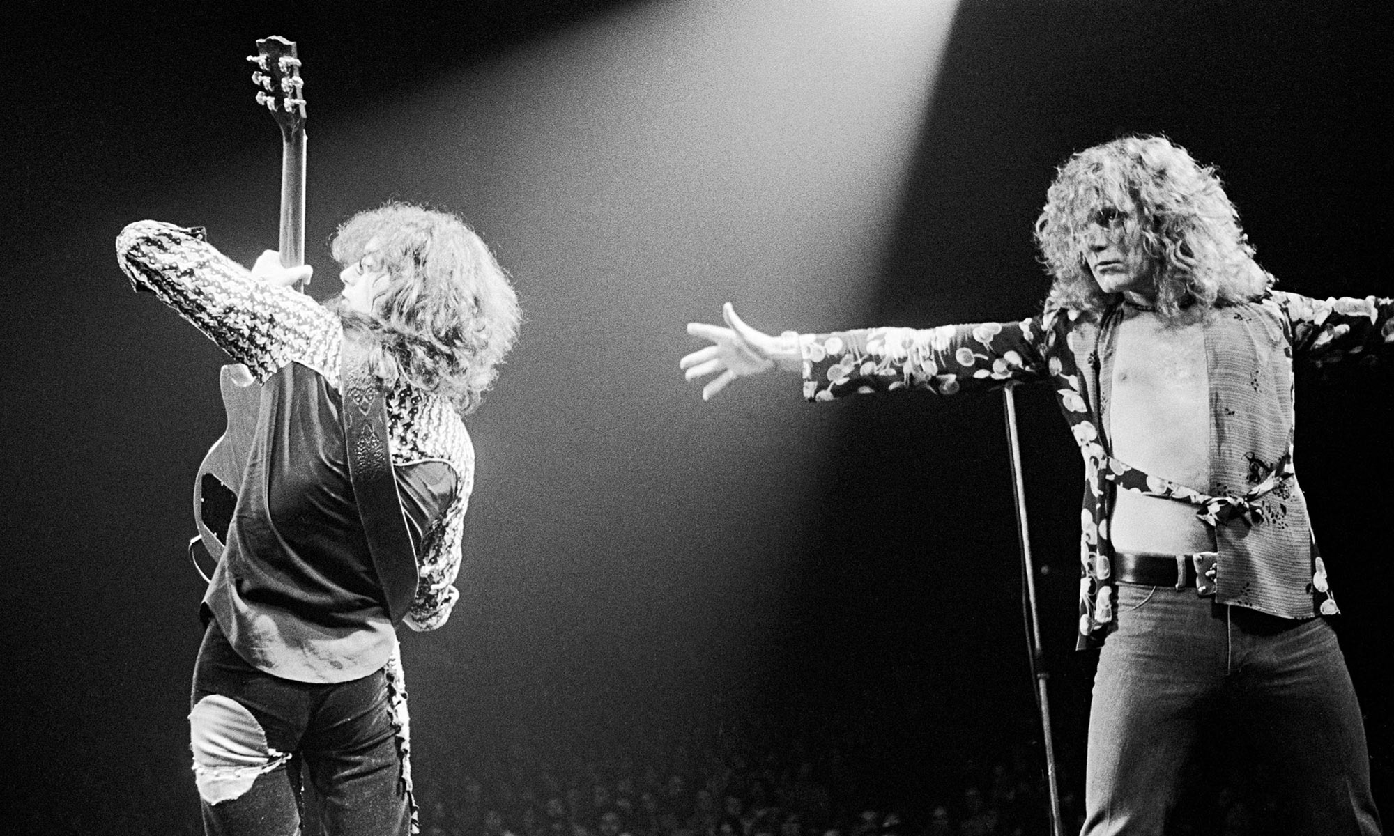 123 ROCK | Led Zeppelin | Robert Plant (Robert Anthony Plant) - August 20, 1948 - West Bromwich, Staffordshire, England, United Kingdom - Lead Vocals, Backing Vocals, Acoustic Guitar, Bass Guitar, Tambourine, Harmonica (1968 - 1980) (1994) (1998), Jimmy Page (James Patrick Page) - January 9, 1944 - Heston, Middlesex, London, England, United Kingdom - Electric Guitars, Rhythm Guitar, Acoustic Guitar, Twelve-string Guitar, Pedal Steel Guitars, Lap Steel Guitar, Slide Guitar, Double Neck Guitar with Six-String and Twelve-String, Bass Guitar, Mandolin, Theremin, Banjo, Dulcimer, The Gizmo, Backing Vocals (1968 - 1980) (1994) (1998), John Paul Jones (John Baldwin) - January 3, 1946 - Sidcup, Kent, London, England, United Kingdom - Bass Guitar, Guitar, Mandolin, Double Bass, Keyboards, Organ, Piano, Acoustic Piano, Electric Piano, Mellotron, Synthesizer, VCS3 Synthesizer, Hohner Clavinet, Hammond Organ, Harpsichord, Moog Synthesizer, Bass Guitar Effects Unit, Recorder, Backing Vocals (1968 - 1980), John Bonham (John Henry Bonham) (Also called : Bonzo, The Beast, Powerhouse) - May 31, 1948 - Redditch, Worcestershire, England, United Kingdom - Drums, Percussions, Timpani, Backing Vocals (1968 - 1980) | Genre : Hard Rock, Heavy Metal, Blues Rock, Folk Rock, Progressive Rock, Psychedelic Rock | Live | Concert | Photo | 30 | Photograph