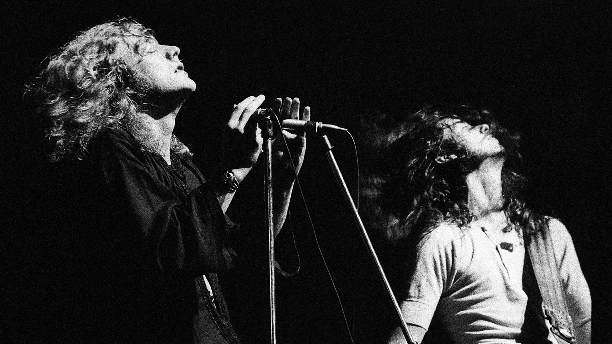123 ROCK | Led Zeppelin | Robert Plant (Robert Anthony Plant) - August 20, 1948 - West Bromwich, Staffordshire, England, United Kingdom - Lead Vocals, Backing Vocals, Acoustic Guitar, Bass Guitar, Tambourine, Harmonica (1968 - 1980) (1994) (1998), Jimmy Page (James Patrick Page) - January 9, 1944 - Heston, Middlesex, London, England, United Kingdom - Electric Guitars, Rhythm Guitar, Acoustic Guitar, Twelve-string Guitar, Pedal Steel Guitars, Lap Steel Guitar, Slide Guitar, Double Neck Guitar with Six-String and Twelve-String, Bass Guitar, Mandolin, Theremin, Banjo, Dulcimer, The Gizmo, Backing Vocals (1968 - 1980) (1994) (1998), John Paul Jones (John Baldwin) - January 3, 1946 - Sidcup, Kent, London, England, United Kingdom - Bass Guitar, Guitar, Mandolin, Double Bass, Keyboards, Organ, Piano, Acoustic Piano, Electric Piano, Mellotron, Synthesizer, VCS3 Synthesizer, Hohner Clavinet, Hammond Organ, Harpsichord, Moog Synthesizer, Bass Guitar Effects Unit, Recorder, Backing Vocals (1968 - 1980), John Bonham (John Henry Bonham) (Also called : Bonzo, The Beast, Powerhouse) - May 31, 1948 - Redditch, Worcestershire, England, United Kingdom - Drums, Percussions, Timpani, Backing Vocals (1968 - 1980) | Genre : Hard Rock, Heavy Metal, Blues Rock, Folk Rock, Progressive Rock, Psychedelic Rock | Live | Concert | Photo | 31 | Photograph